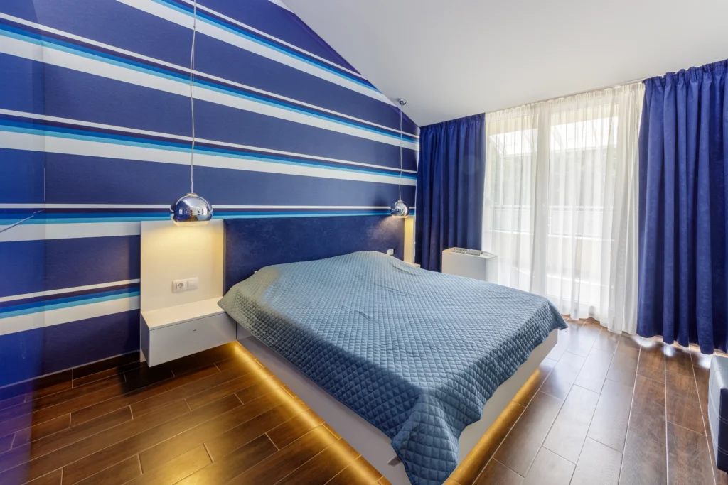 Bedroom in a maisonette suite at Park Hotel Revita